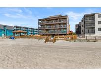 Beautiful beachfront condo with multiple balconies, ocean views and private beach access at 806 N Waccamaw Dr. # 104, Murrells Inlet, SC 29576