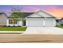 Charming single-Gathering home with a two-car garage and a well-manicured lawn at 625 Woodside Dr., Conway, SC 29526