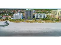 Expansive beachfront resort featuring multiple pools and lush landscaping along a pristine white sand beach at 6804 N Ocean Blvd. # 523, Myrtle Beach, SC 29572