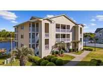 Condominium with nice landscaping, multiple balconies and water view at 214 Landing Rd. # I, North Myrtle Beach, SC 29582