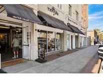 Street view of shops with awnings and a restaurant entrance at 815 Front St. # 2-H, Georgetown, SC 29440