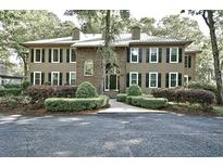 Traditional two-story home with brick and siding, dormers and mature landscaping at 273 Golden Bear Dr. # F3, Pawleys Island, SC 29585