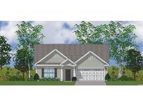 Charming single-Gathering home showcases a traditional design with neutral siding, a gray roof, and an attached garage at 4027 Bucolic Loop, Myrtle Beach, SC 29588