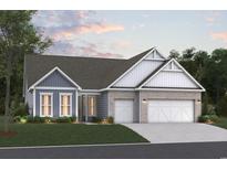Charming home boasts a two-car garage, manicured lawn, and inviting curb appeal at 124 Northbrook Dr, Murrells Inlet, SC 29576