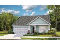 Charming one-story home featuring a covered porch, stone accents, and a two-car garage at 1425 Seachase Way, North Myrtle Beach, SC 29582