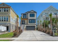 Beautiful two-story home with a large driveway, complemented by lush landscaping and mature palm trees at 168 West Palms Dr., Myrtle Beach, SC 29579