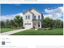 Charming two-story home with white siding, a welcoming front door, and a well-manicured lawn at 2523 Hillbourne Loop, North Myrtle Beach, SC 29582
