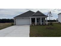 Charming single-story home with a manicured lawn, gray siding, and a convenient attached one car garage at 418 Acosta Circle, Conway, SC 29527