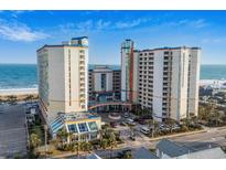 Stunning aerial view of the oceanfront resort with multiple towers and beautiful landscaping at 5200 N Ocean Blvd. # 632, Myrtle Beach, SC 29577