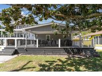 Inviting covered back deck features outdoor seating, perfect for entertaining or relaxing outdoors at 6001-Mh409 S Kings Hwy., Myrtle Beach, SC 29575