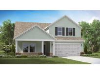 Charming two-story home featuring a welcoming porch and well-maintained landscaping at 8718 Baton Rouge Ave Nw, Calabash, NC 28467