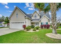 Charming home with a well-manicured lawn, attached garage, and mature landscaping and inviting curb appeal at 1001 Harvest View Ave., Conway, SC 29527