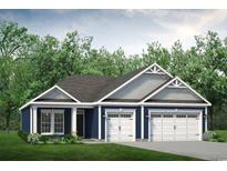Charming blue single-Gathering home with a three-car garage and beautifully landscaped front yard at 2222 Seagrape Dr., Little River, SC 29566