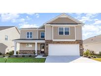 Two-story home with a two-car garage, covered porch, and stone and siding exterior at 434 Clear Lake Dr., Conway, SC 29526