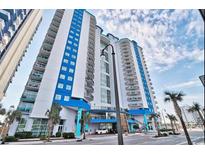 Stunning exterior of a modern high-rise condo building with beautiful blue and white accents and multiple balconies at 504 N Ocean Blvd. # 1810, Myrtle Beach, SC 29577
