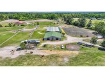 Expansive horse property featuring barns, riding arenas, paddocks, and pastures for equestrian enthusiasts at 6200 Adrian Pkwy., Conway, SC 29526