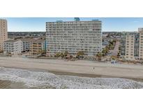 Oceanfront resort featuring a pool, beach access, and well-maintained grounds for a relaxing vacation experience at 1012 N Waccamaw Dr. # 507, Murrells Inlet, SC 29576
