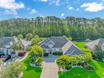 Stunning aerial view of the home showcasing landscaped front yard and beautiful surroundings at 178 Kessinger Dr., Surfside Beach, SC 29575