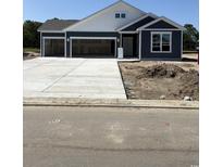 New construction home with a three car garage and concrete driveway at 190 Glengrove Lane, Murrells Inlet, SC 29576