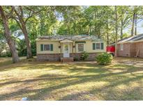 Charming single-story home with green shutters and a well-maintained front lawn at 508 Pearl St., Conway, SC 29527