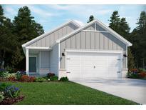 Charming single-Gathering home with a two-car garage, manicured lawn, and welcoming curb appeal at 867 Cypress Preserve Circle, Longs, SC 29568