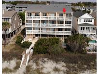 Multi-level condo with direct beach access and multiple balconies offers stunning ocean views at 813 S Ocean Blvd. # 301, Surfside Beach, SC 29575