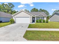Charming single-story home featuring a well-maintained lawn and a two-car garage at 122 Desurrency Ct., Georgetown, SC 29440