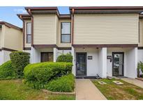 Inviting townhouse exterior with landscaped front yard and visible unit number at 1012 Possum Trot Rd. # F 42, North Myrtle Beach, SC 29582