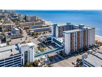 Expansive aerial view of a beachfront condo complex with pools and ocean views at 1501 S Ocean Blvd. # 842, Myrtle Beach, SC 29577