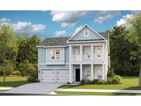 Charming two-story home with a welcoming front porch and a well-manicured lawn at 3300 Bay View Ct., North Myrtle Beach, SC 29582