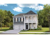 Charming two-story home with a welcoming front porch and two-car garage at 3320 Bay View Ct., North Myrtle Beach, SC 29582