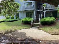 Charming condo complex with meticulously maintained landscaping and inviting entrance at 409 Salt Marsh Circle # 20C, Pawleys Island, SC 29585