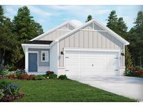 Charming single-story home featuring a two-car garage, beautifully landscaped yard, and a welcoming blue front door at 862 Cypress Preserve Circle, Longs, SC 29568