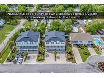 Spacious, coastal homes offer an incredible opportunity for beach living with ample parking and serene landscaping at 1005 Kelly Ct., Garden City Beach, SC 29576