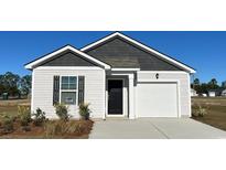 Charming single-story home featuring a one-car garage, black door, and complementary white and gray siding at 296 Clear Lake Dr., Conway, SC 29526