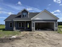 Charming home with a two-car garage and stone accents at 4963 Dupont Rd., Aynor, SC 29511