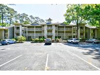 View of the condominiums with parking and landscaped grounds at Lighthouse Point Villas at 1401 Lighthouse Dr. # 4226, North Myrtle Beach, SC 29582