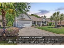 Charming single-story home features a well-manicured lawn, mature landscaping, and an attached two-car garage at 156 Summerlight Dr., Murrells Inlet, SC 29576