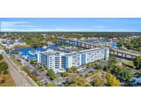 High-rise condo building with Intracoastal Waterway views, landscaped grounds, and parking at 2100 Sea Mountain Hwy. # 224, North Myrtle Beach, SC 29582