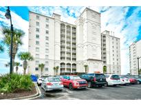 Exterior of a beachfront condo featuring multiple floors, balconies, and convenient parking at 2151 Bridge View Ct. # 2302, North Myrtle Beach, SC 29582