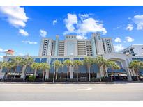 A resort featuring covered parking, palm trees, and an oceanfront location at 2401 S Ocean Blvd. # 752, Myrtle Beach, SC 29577