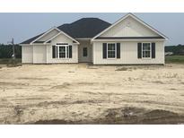 New construction home features a black roof and white siding, with black shutters at 3601 Valley Forge Rd., Aynor, SC 29511