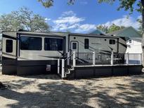 The travel trailer has an outdoor deck space, providing a great spot for relaxation and outdoor dining at 6001-N53 S Kings Hwy., Myrtle Beach, SC 29575