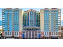 Luxury beachfront condo building featuring multiple floors, balconies, and ocean views at 603 S Ocean Blvd. # 912, North Myrtle Beach, SC 29582