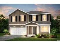 Two-story home featuring board and batten siding, black shutters, and a two-car garage at 1011 Laconic Dr., Myrtle Beach, SC 29588