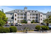 Beautiful condo complex boasting lovely landscaping, lots of parking, and multiple floors with balconies at 1025 World Tour Blvd. # 301, Myrtle Beach, SC 29579