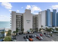 Horizon East beachfront condo complex featuring multiple floors, parking, and ocean views at 1108 N Waccamaw Dr. # C-4, Garden City Beach, SC 29576