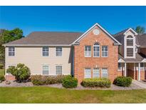 Attractive two-story townhouse featuring a brick facade and well-maintained landscaping at 4276 Santolina Way # A, Murrells Inlet, SC 29576