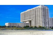 Stunning beachfront resort with balconies and a view of the ocean on a clear day at 9840 Queensway Blvd. # 1819, Myrtle Beach, SC 29572