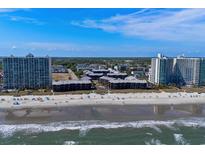 Wide aerial shot of the oceanfront property, beach and building complex at 108 N Ocean Blvd. # 308, North Myrtle Beach, SC 29582